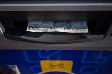 Cash from a bank machine — Falmouth has ordinary ATMs and cambios, and no crypto machine