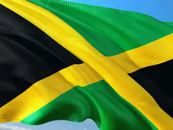 The Jamaican flag, symbol of the jurisdiction whose rules decide how crypto can be bought and sold on the island